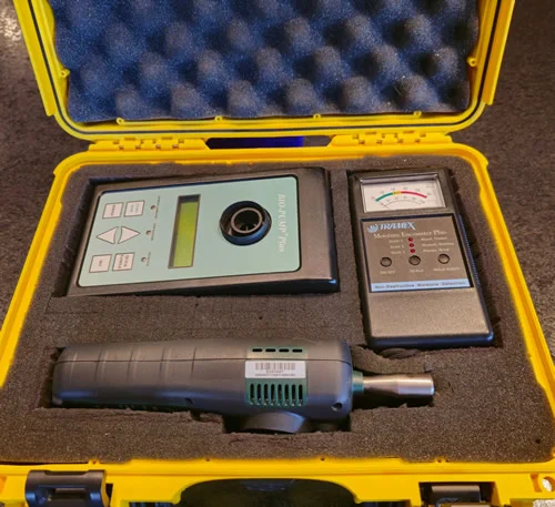 Professional mold inspection toolkit with moisture meters, hygrometers, and infrared cameras for accurate mold testing.
